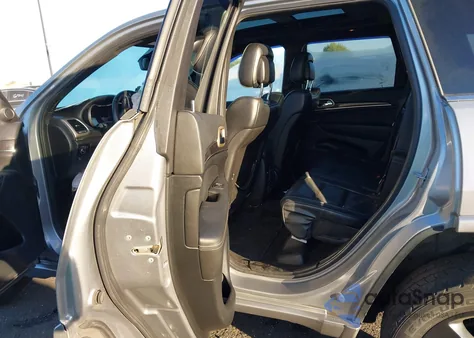 2014 Jeep Grand Cherokee Overland z USA, uszkodzony, nr VIN 1C4RJECTXEC212434